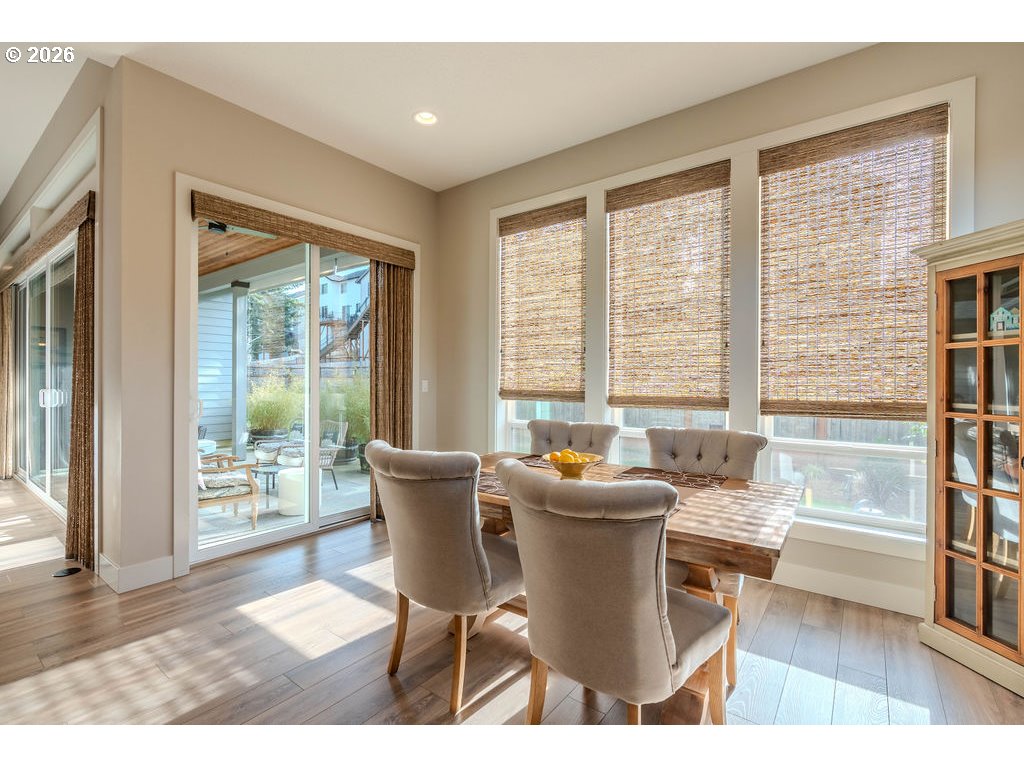 38408 Juniper Street Sandy, OR 97055 - Photo 32 of 47 a view of a dining room with furniture and wooden floor