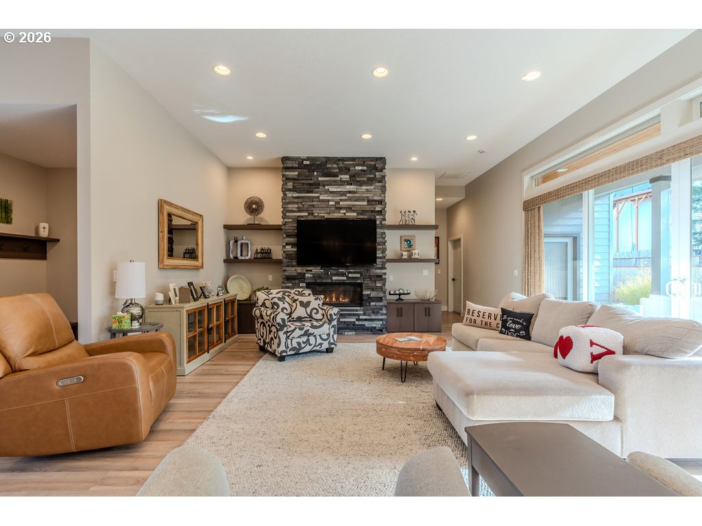 38408 Juniper Street Sandy, OR 97055 - Photo 37 of 47 a living room with fireplace furniture and a flat screen tv