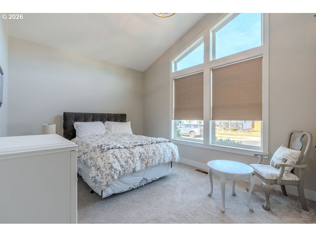 38408 Juniper Street Sandy, OR 97055 - Photo 8 of 47 a bedroom with a bed and a window