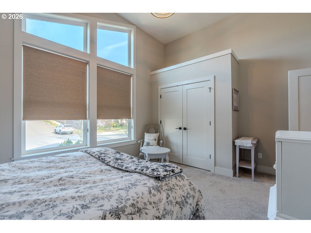 38408 Juniper Street Sandy, OR 97055 - Photo 9 of 47 a bedroom with a bed and a large window