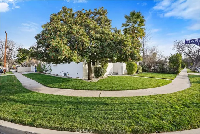 a view of a house with a park