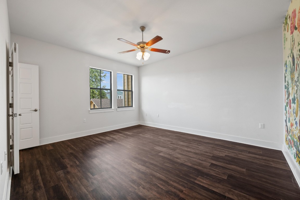 3904 Teaff Street Austin, TX 78723 - Photo 18 of 33 wooden floor in an empty room with a window
