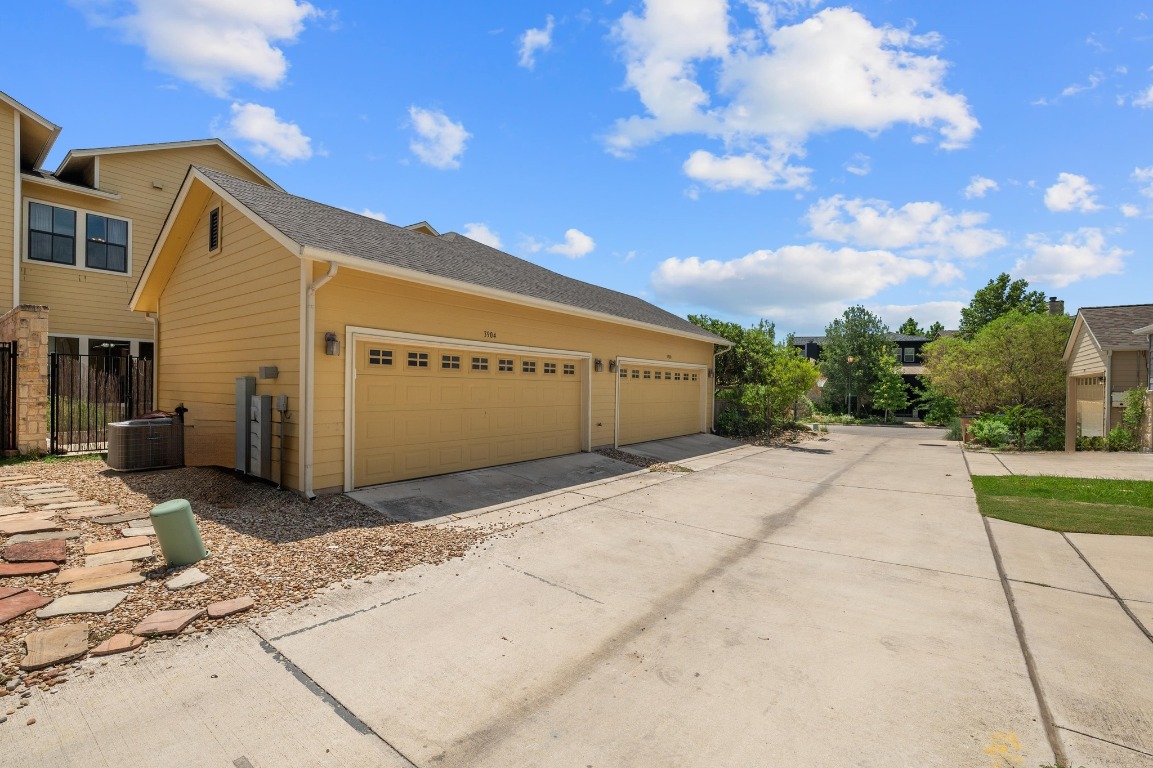 3904 Teaff Street Austin, TX 78723 - Photo 27 of 33 With room for two cars and seamless alley entry, the garage keeps your vehicles—and your life—organized and hassle-free