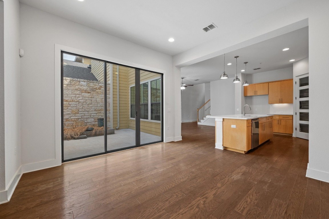 3904 Teaff Street Austin, TX 78723 - Photo 9 of 33 a spacious bathroom with a glass shower door and a bathtub