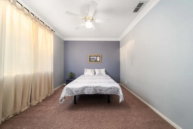 a swimming pool with outdoor seating and yard