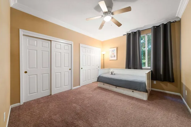 a house view with swimming pool and garden view