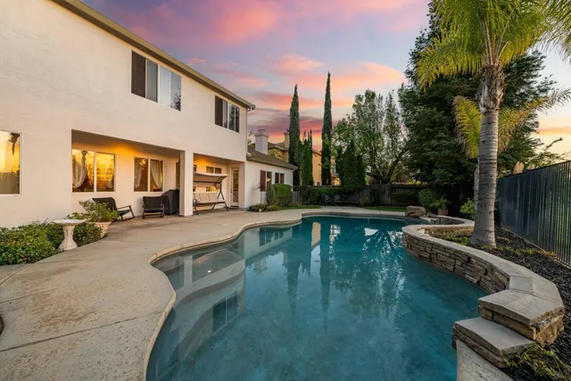 a view of a golf course with a lake
