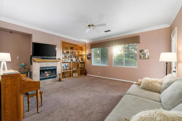 a kitchen with large cabinets appliances a sink and a counter top space