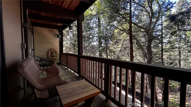 a view of balcony with furniture