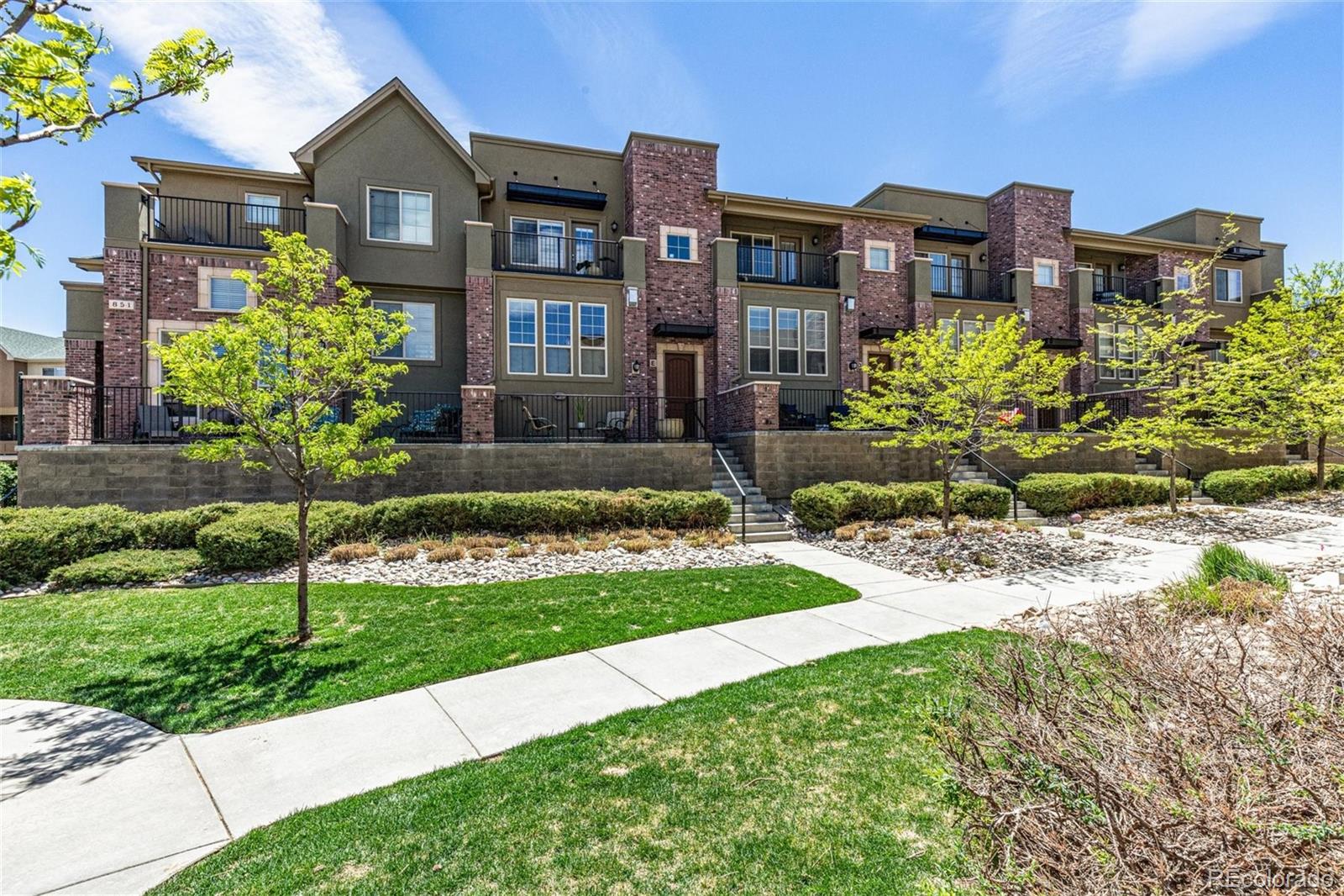 851 Elmhurst Drive, Unit E Highlands Ranch, CO 80129 - Photo 2 of 26