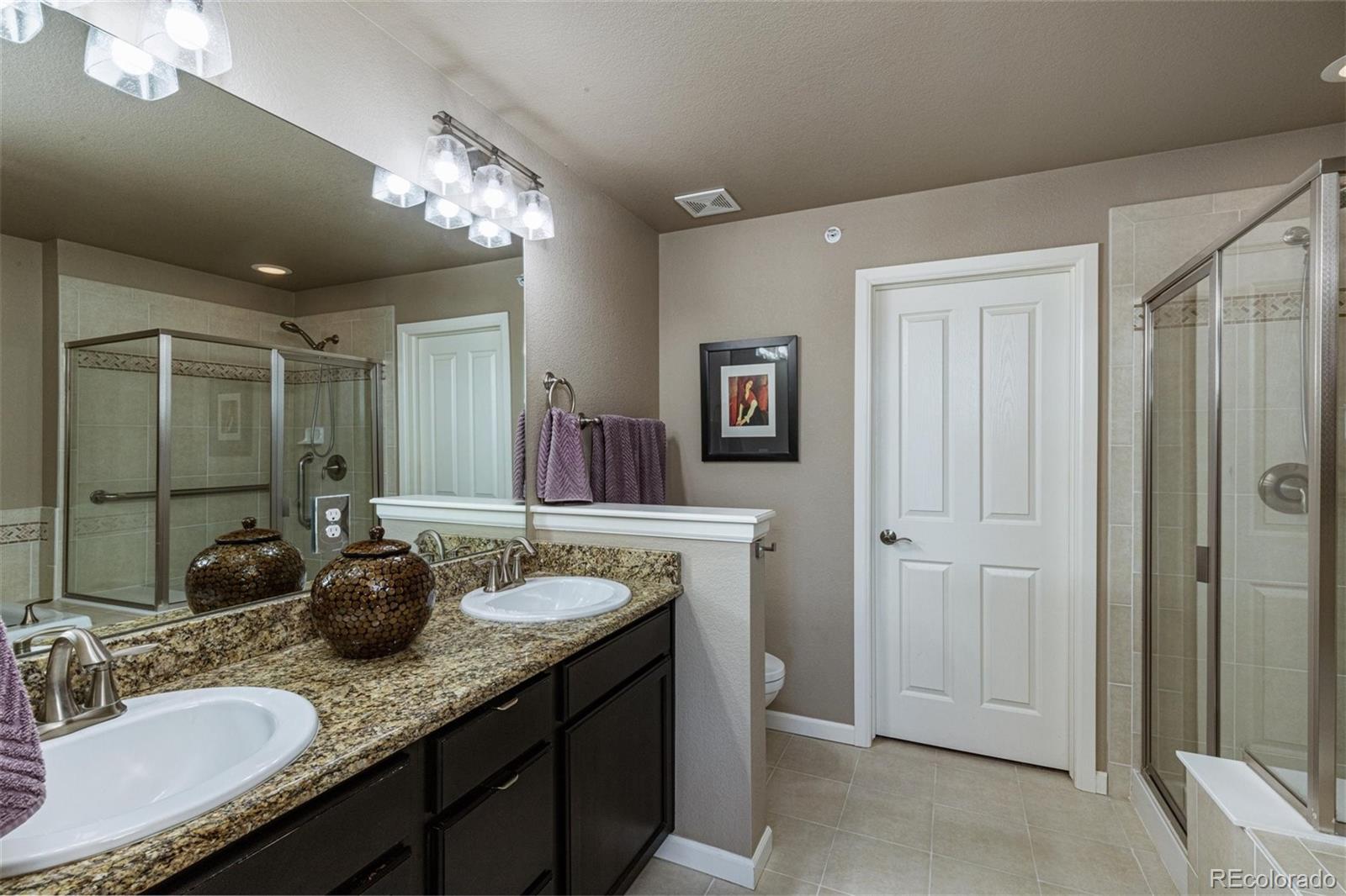 851 Elmhurst Drive, Unit E Highlands Ranch, CO 80129 - Photo 21 of 26