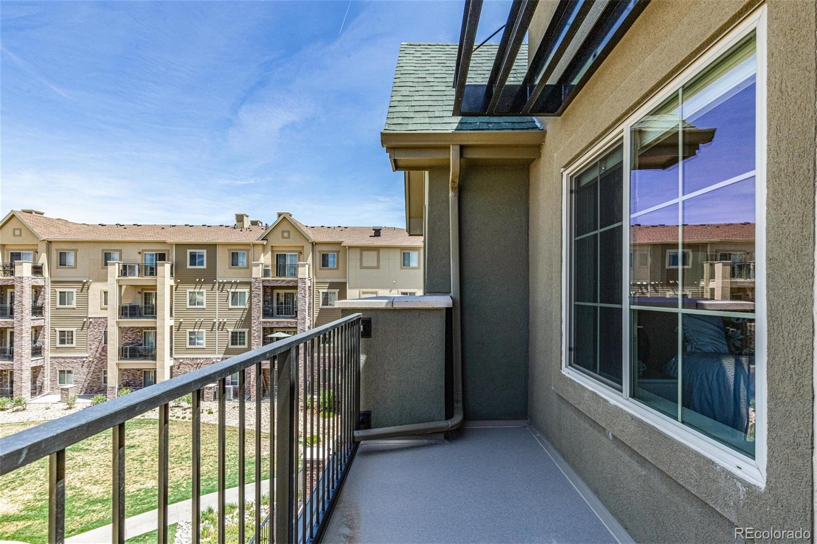 851 Elmhurst Drive, Unit E Highlands Ranch, CO 80129 - Photo 5 of 26