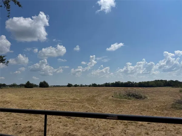 a view of a lake from a yard