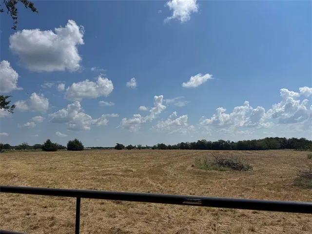 a view of a lake from a yard