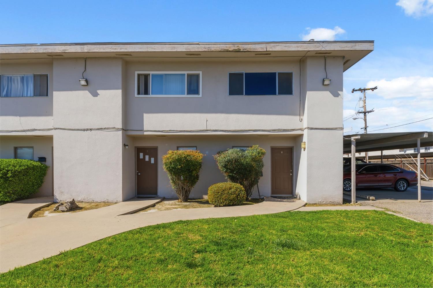 175 South 19th Avenue Lemoore, CA 93245 - Photo 1 of 42 a view of a house with backyard and porch