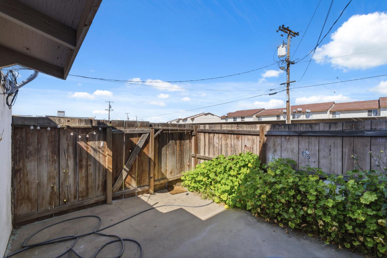 175 South 19th Avenue Lemoore, CA 93245 - Photo 22 of 42 a view of a pathway of a building