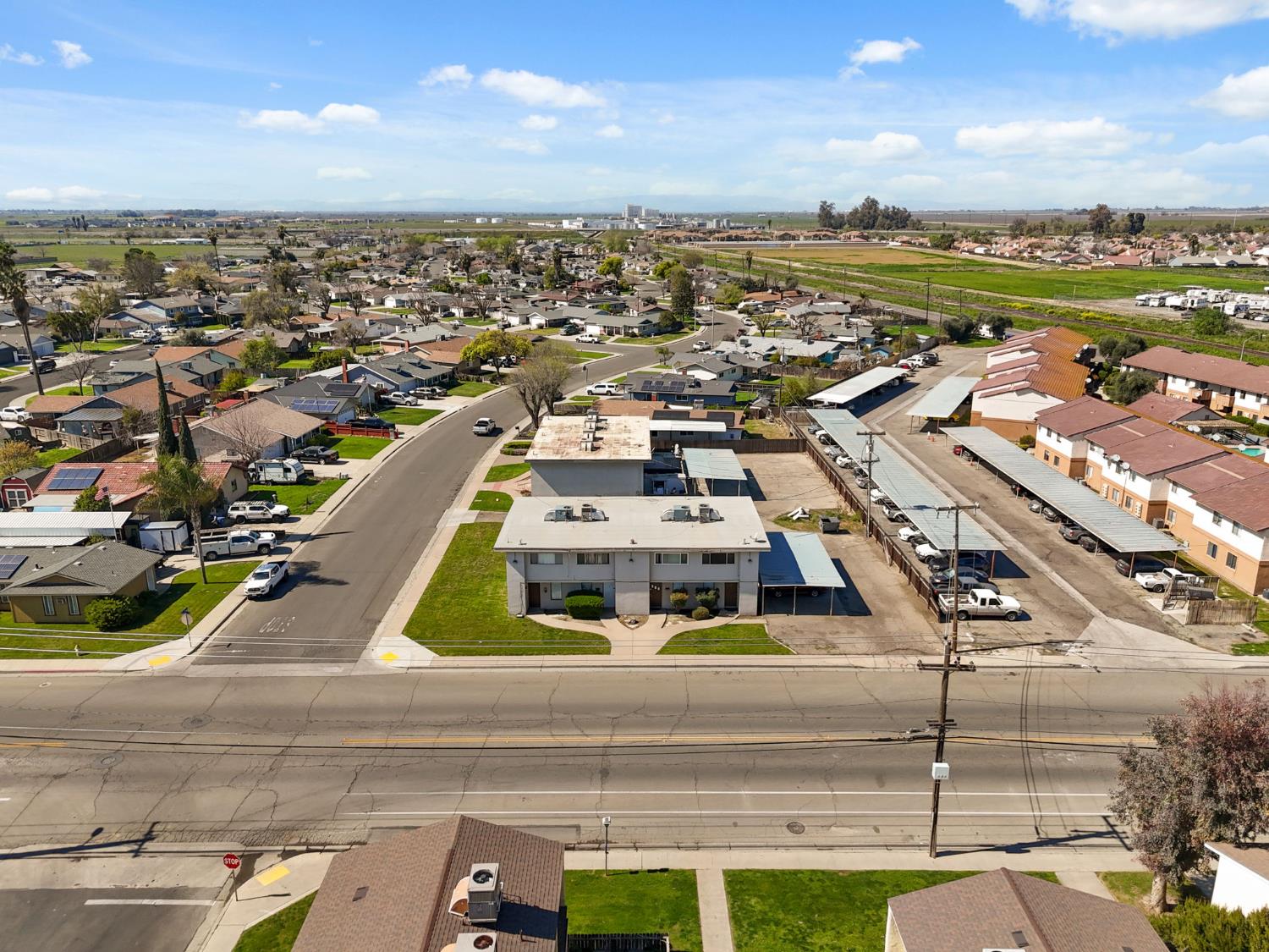 175 South 19th Avenue Lemoore, CA 93245 - Photo 32 of 42 an aerial view of residential houses with outdoor space