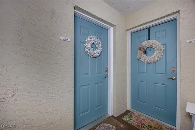 a view of a hallway with elevator