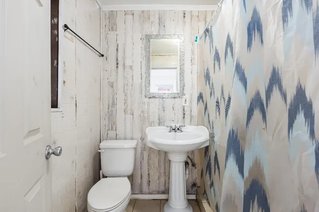 a view of a room with drop ceiling