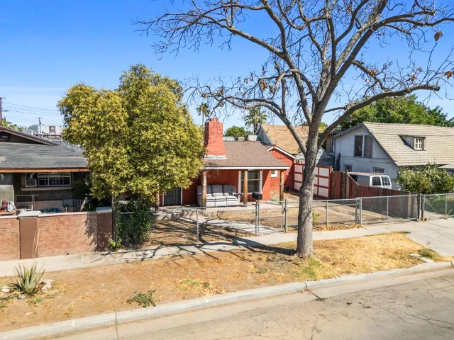 an aerial view of a house with a garden