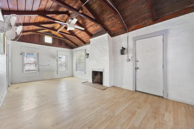 a view of a livingroom with a fireplace