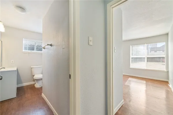 a bathroom with a toilet and a sink