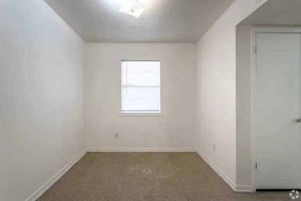 an empty room with a window