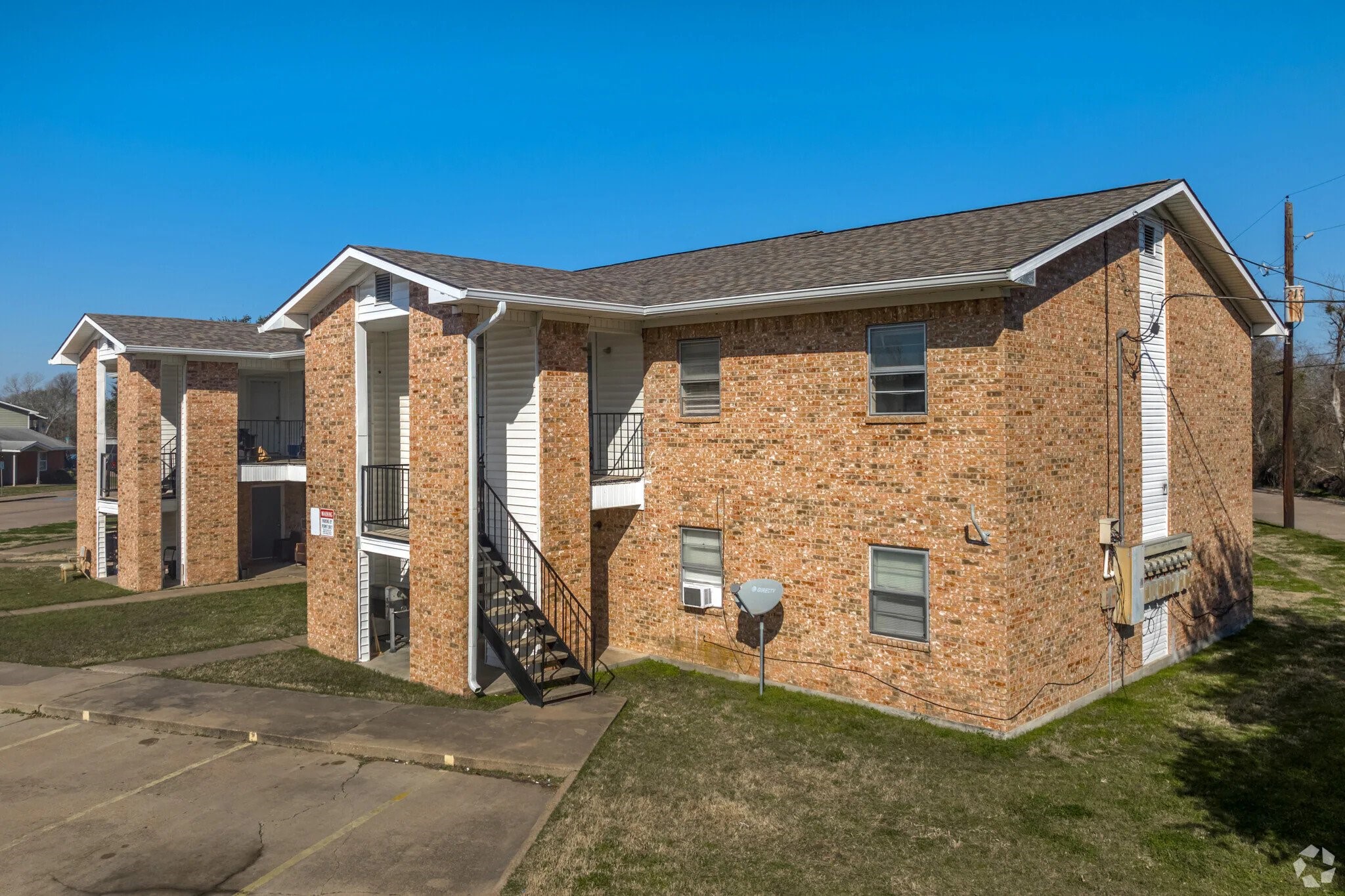 520 Laredo Street Navasota, TX 77868 - Photo 2 of 13 a front view of a house with large windows
