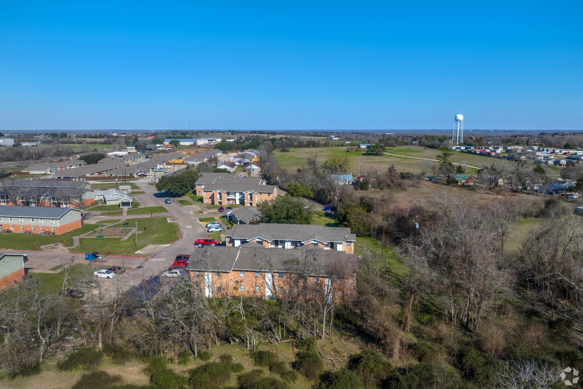 520 Laredo Street Navasota, TX 77868 - Photo 6 of 13 an aerial view of a city with lots of residential buildings