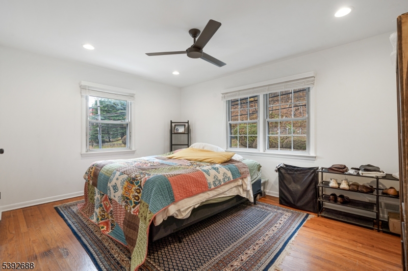 76 Mt Kemble Avenue, Unit 2 Morristown, NJ 07960 - Photo 12 of 23 a bedroom with a bed and wooden floor
