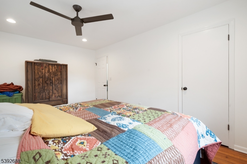 76 Mt Kemble Avenue, Unit 2 Morristown, NJ 07960 - Photo 13 of 23 a bedroom with a bed and a dresser