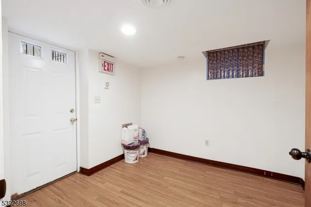 a bathroom with a toilet sink and vanity