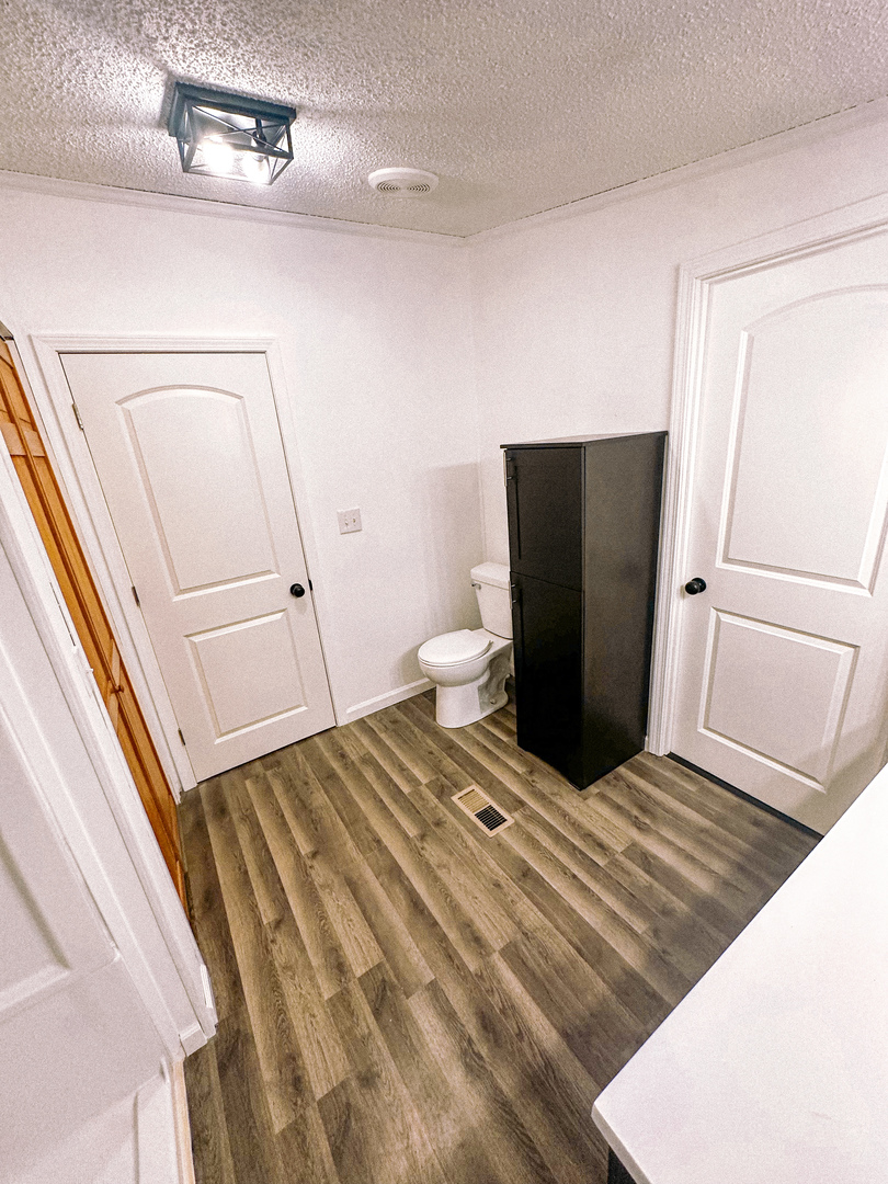 4920 Mt Moriah Road Galatia, IL 62935 - Photo 25 of 33 a bedroom with a bed and a mirror