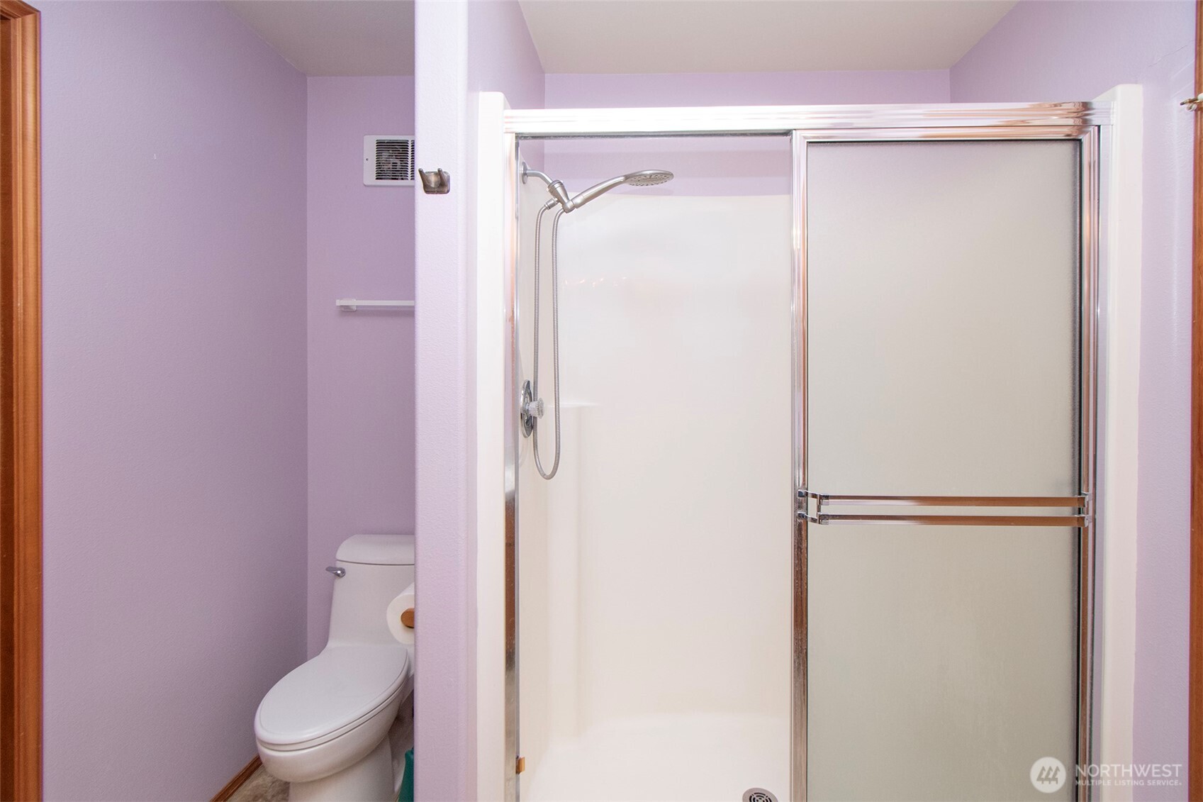 151 Duke Drive Sequim, WA 98382 - Photo 14 of 39 a white toilet sitting next to a bathroom sink