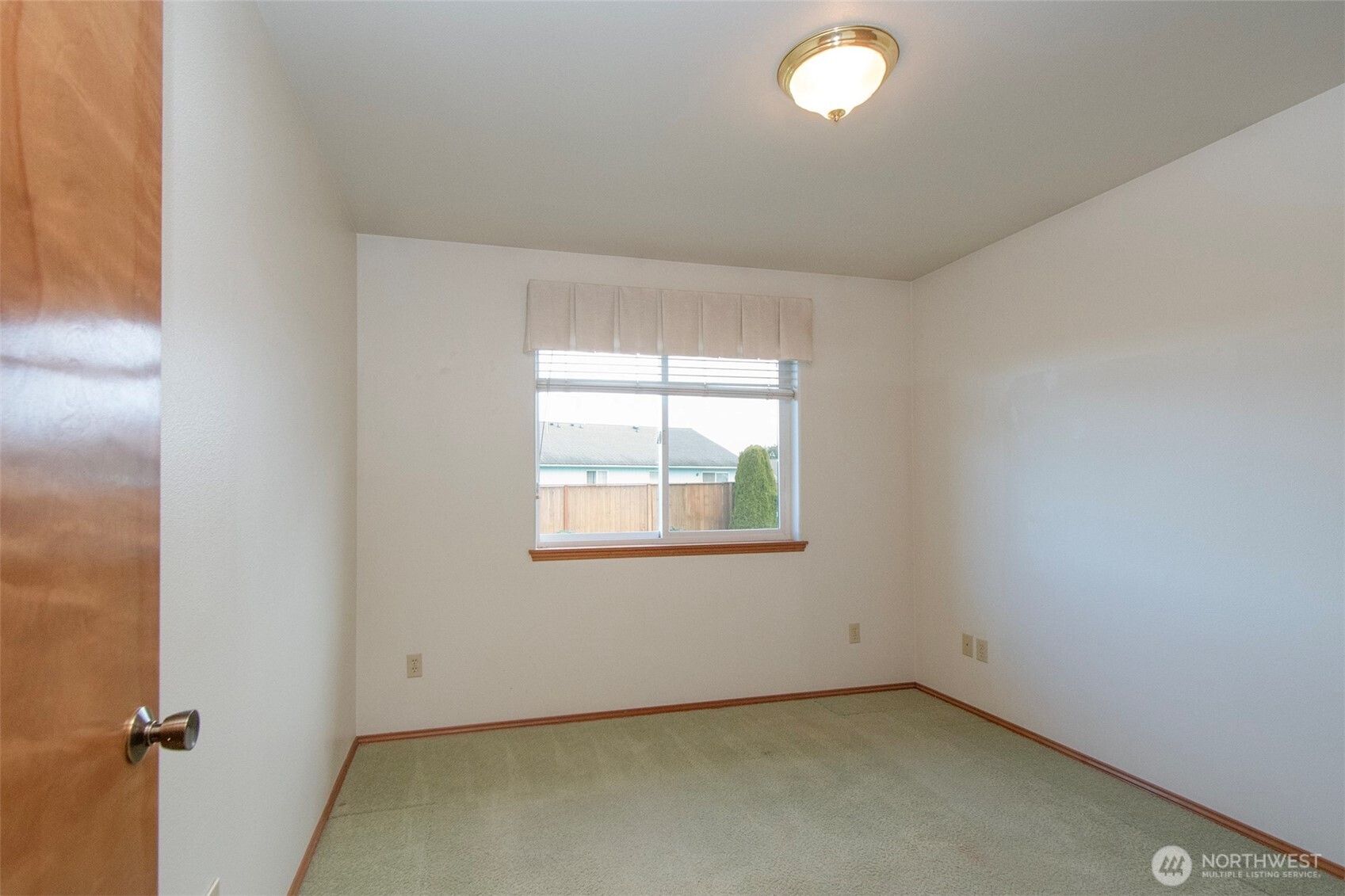151 Duke Drive Sequim, WA 98382 - Photo 18 of 39 an empty room with a window