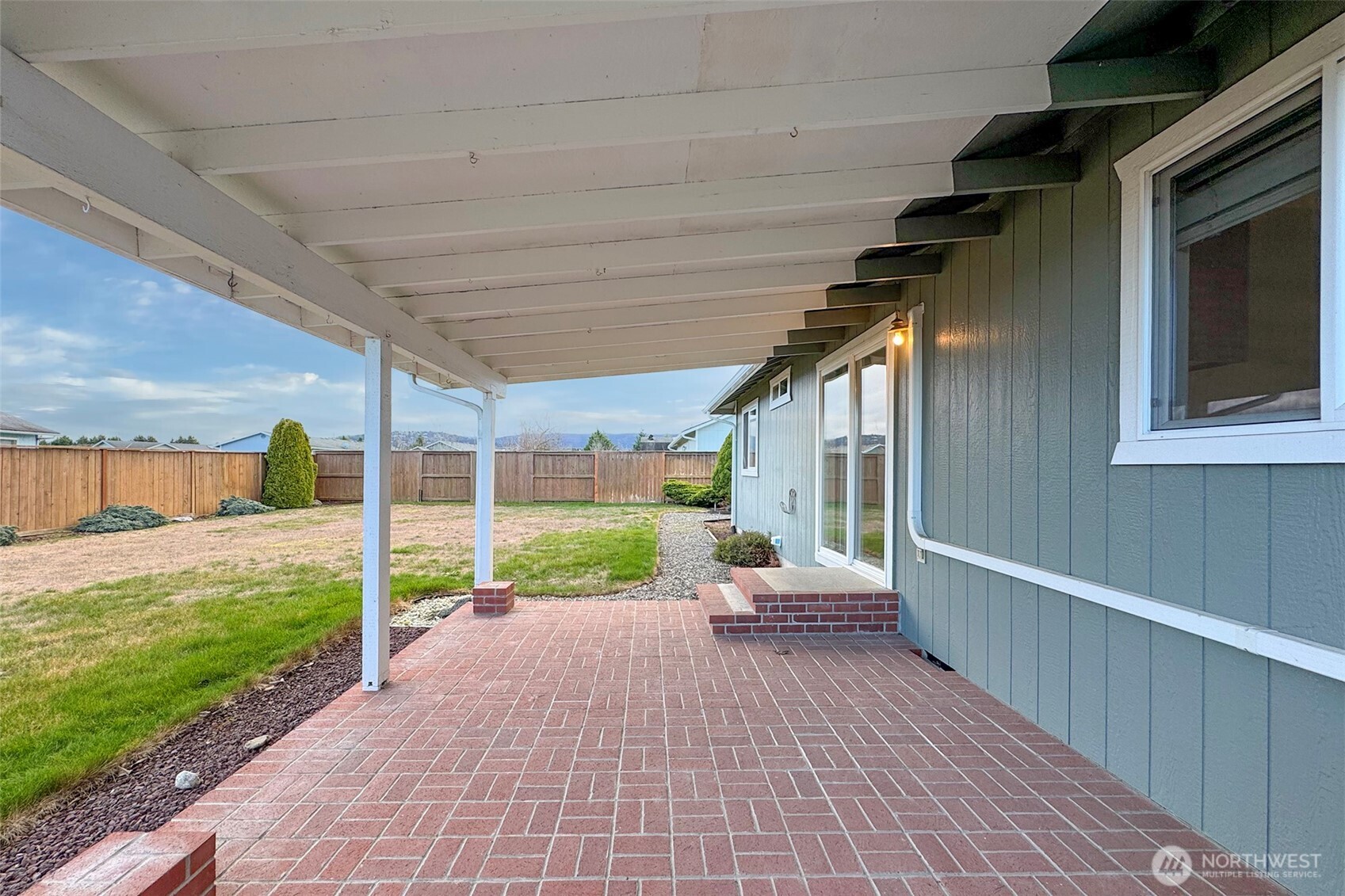 151 Duke Drive Sequim, WA 98382 - Photo 27 of 39 a view of a house with backyard and porch