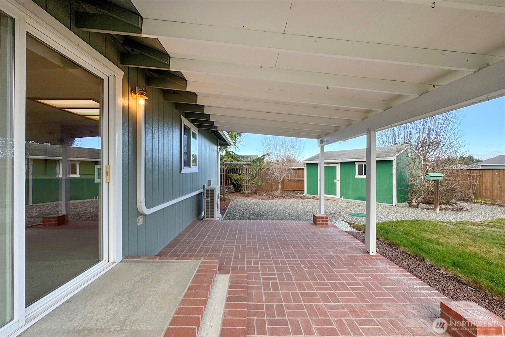 151 Duke Drive Sequim, WA 98382 - Photo 29 of 39 a view of a porch with wooden floor and fence