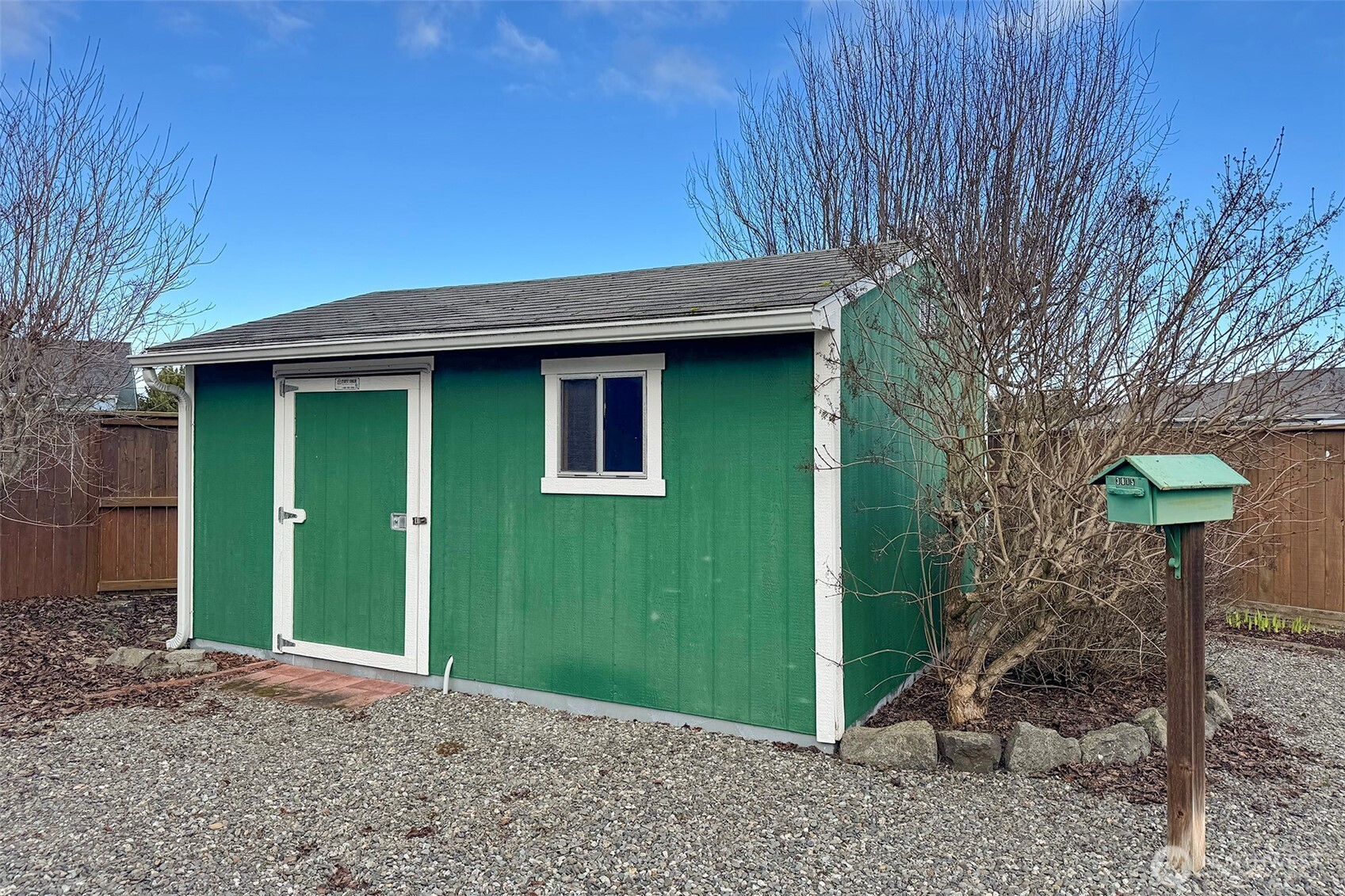 151 Duke Drive Sequim, WA 98382 - Photo 30 of 39 a front view of a house with garden