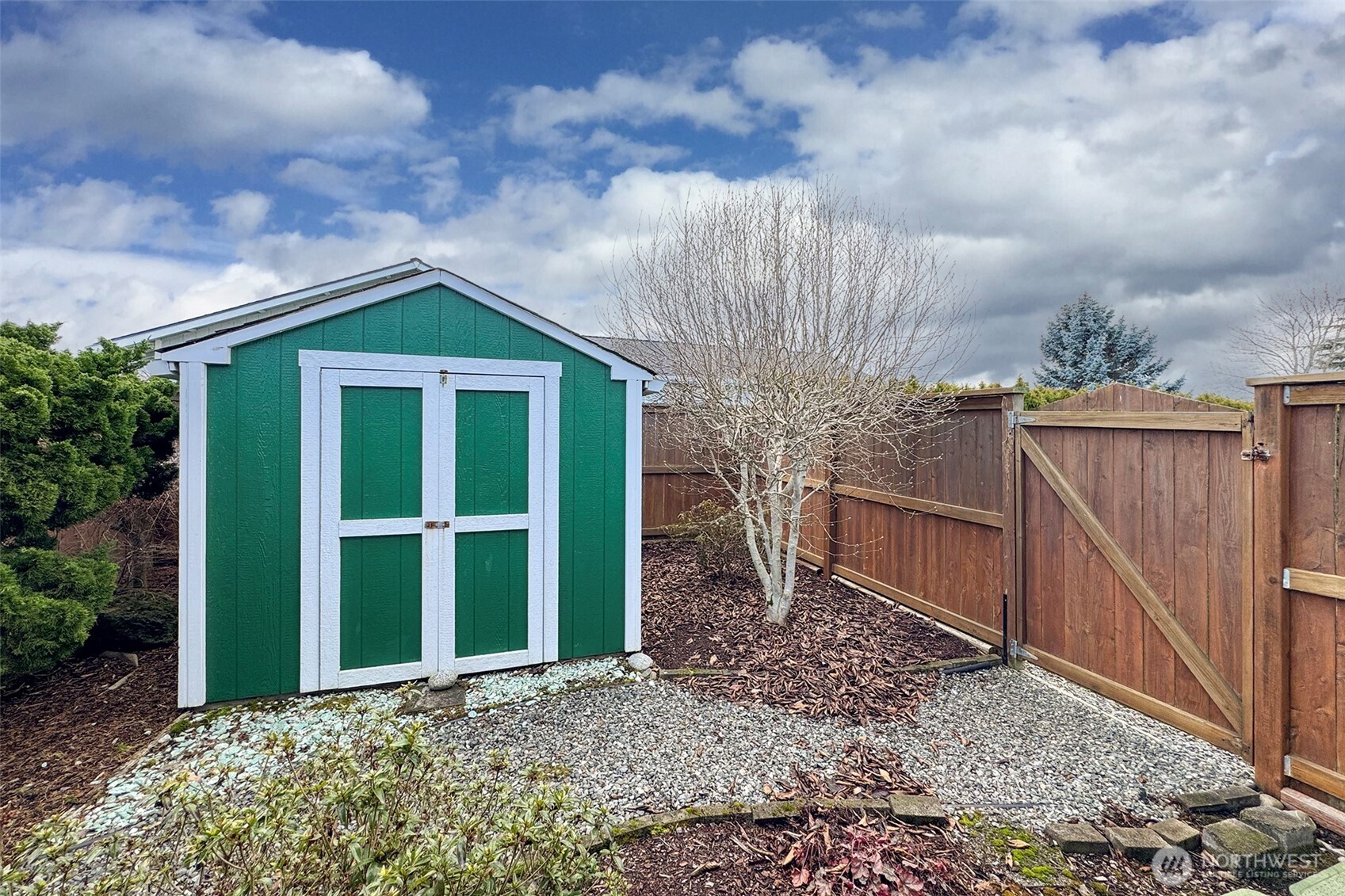 151 Duke Drive Sequim, WA 98382 - Photo 36 of 39 a front view of a house with a garden