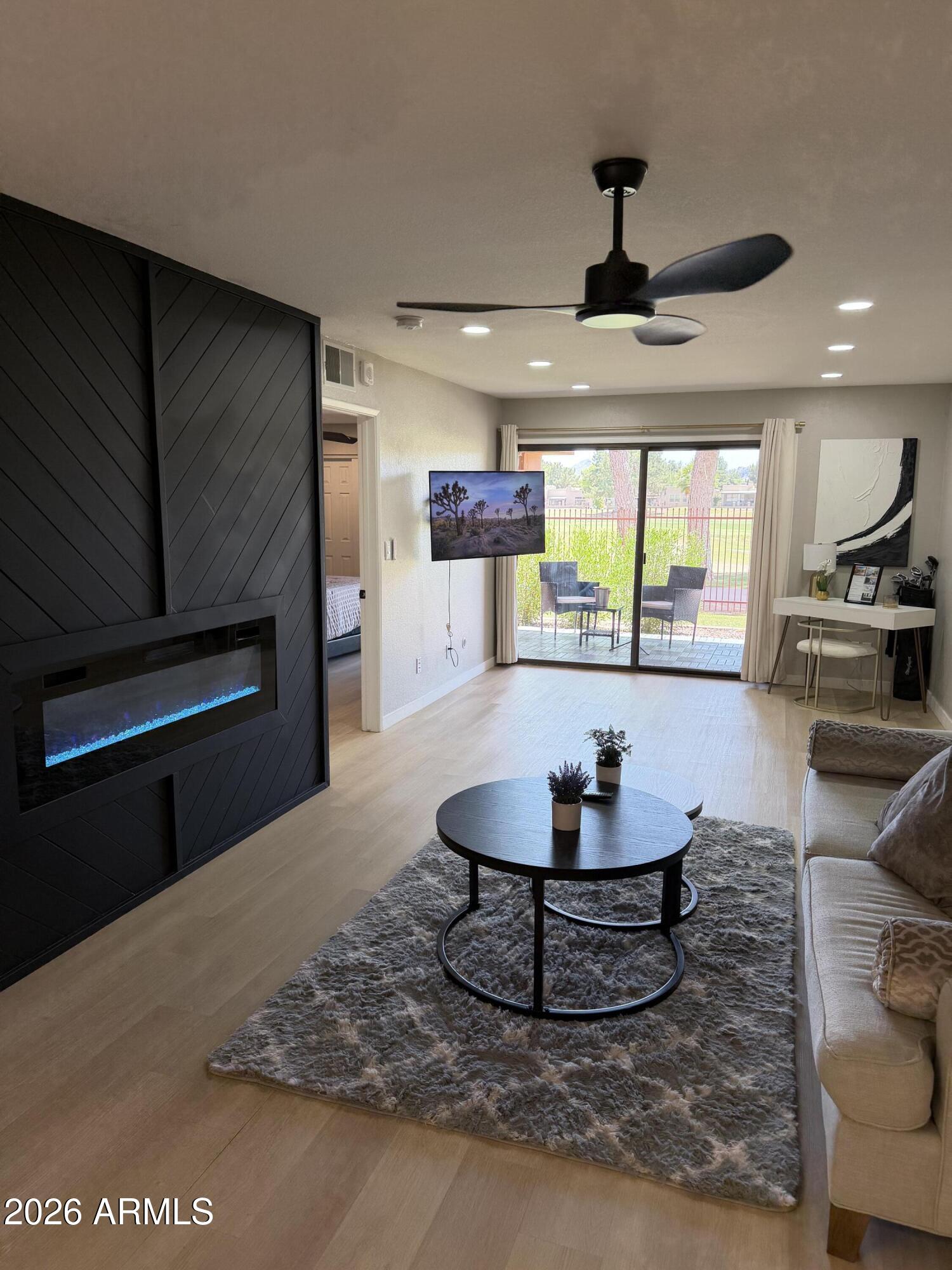 4303 East Cactus Road, Unit 128 Phoenix, AZ 85032 - Photo 6 of 39 a room with kitchen appliances and a counter top