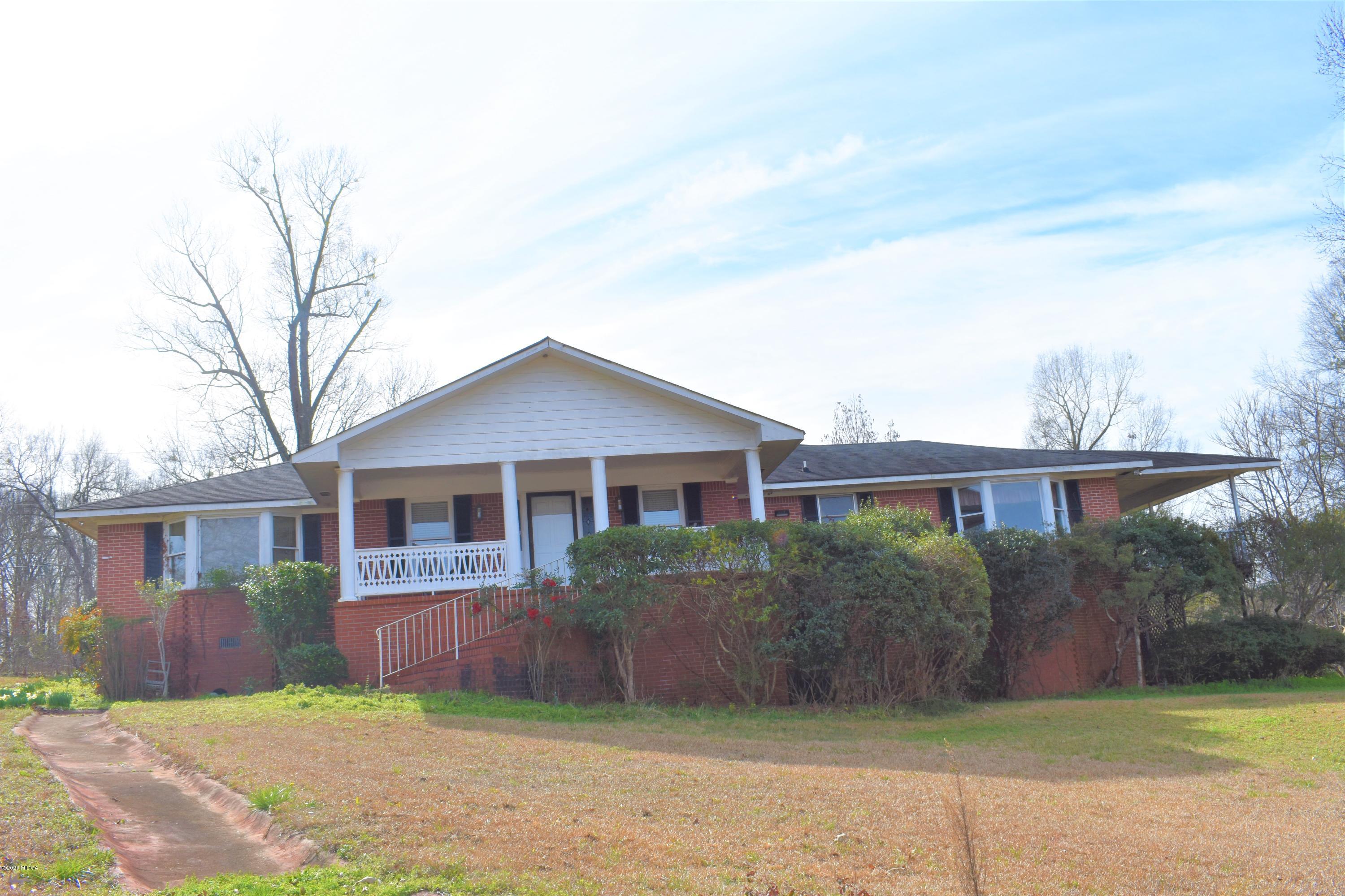 1661 Bonner Gilbert Road Macon, GA 31220 - Photo 1 of 15 front view of a house with a yard