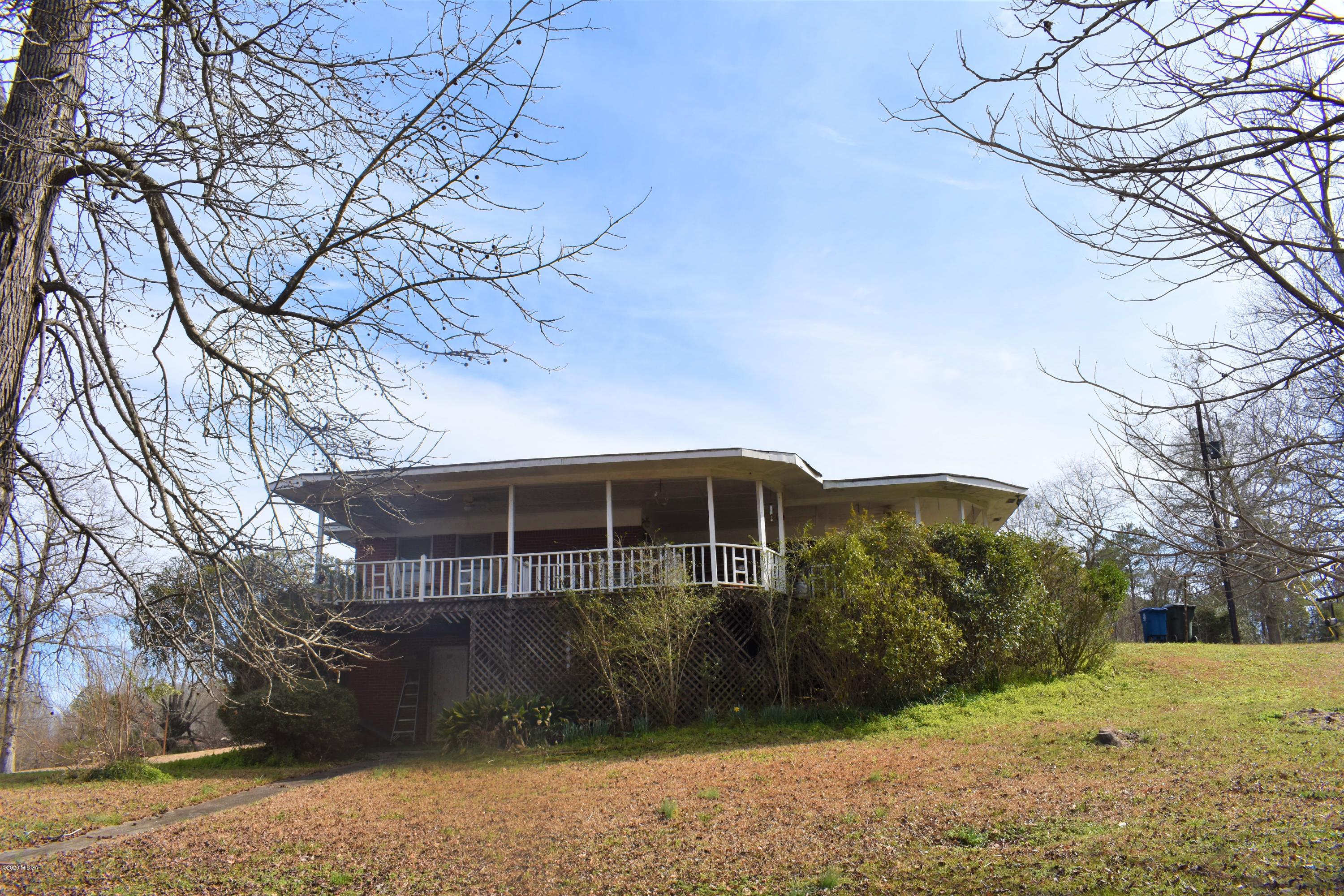 1661 Bonner Gilbert Road Macon, GA 31220 - Photo 2 of 15 a view of a house with a yard