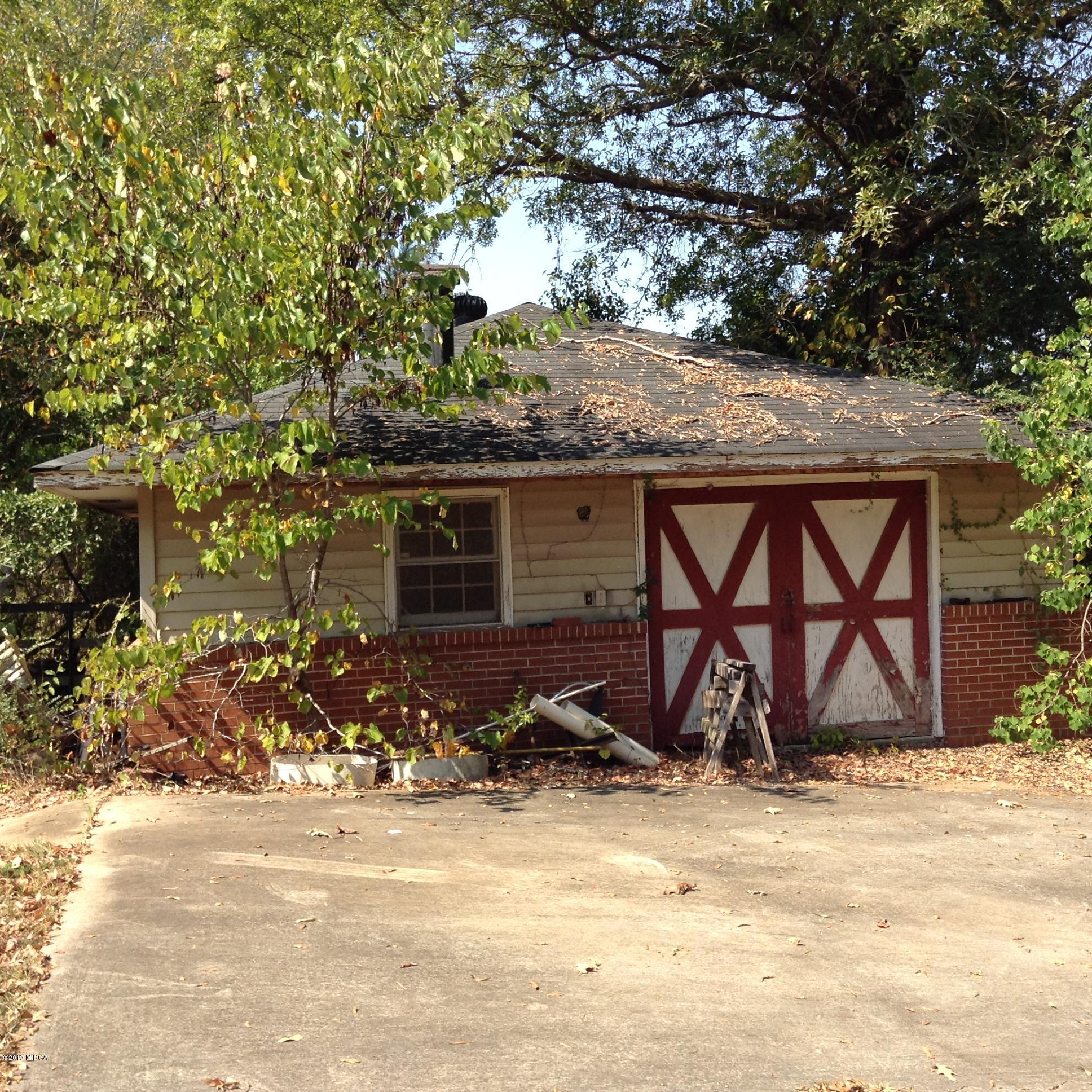 1661 Bonner Gilbert Road Macon, GA 31220 - Photo 15 of 15 a front view of a house with garden