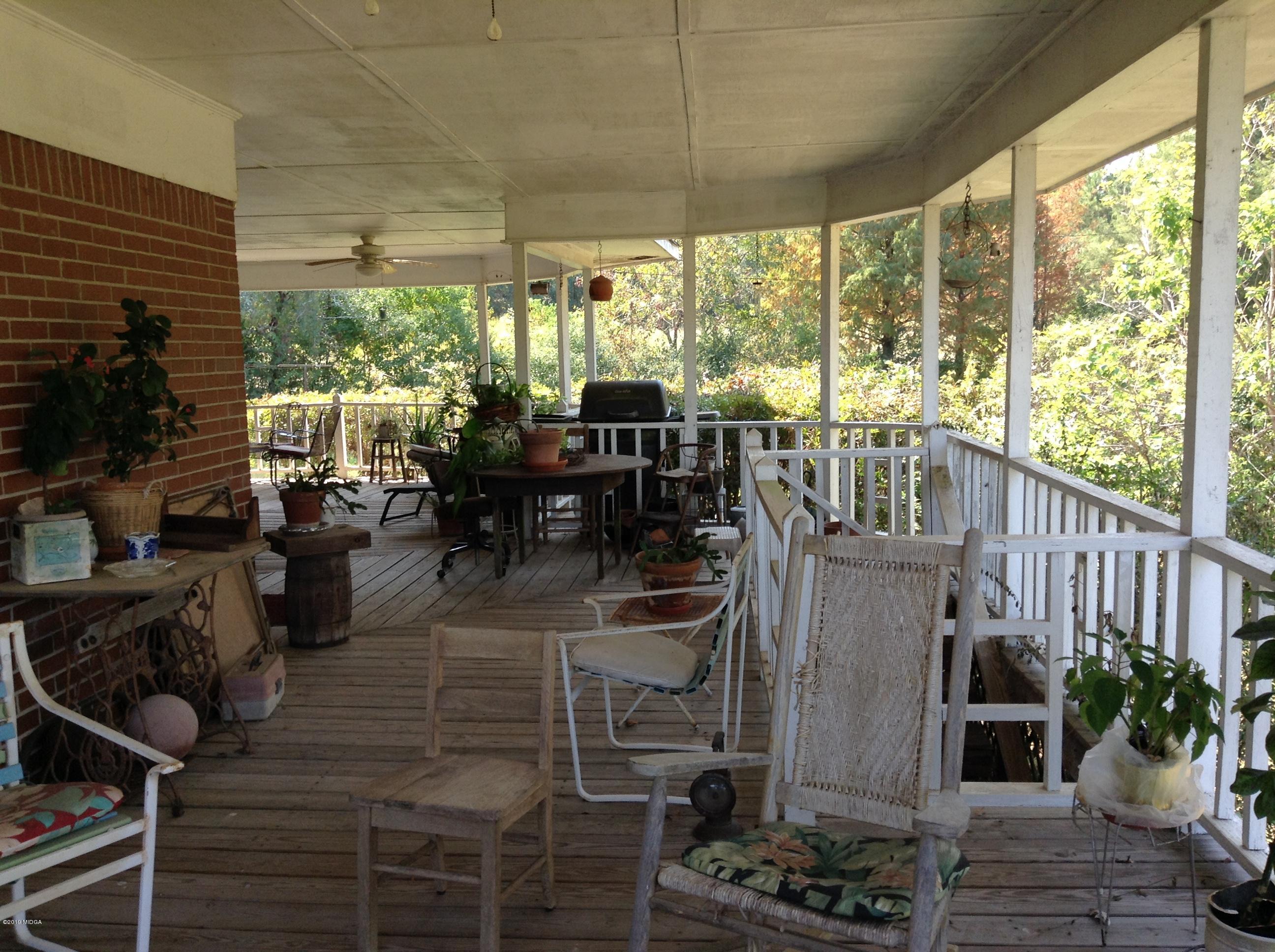 1661 Bonner Gilbert Road Macon, GA 31220 - Photo 3 of 15 a dining room with furniture window and outside view