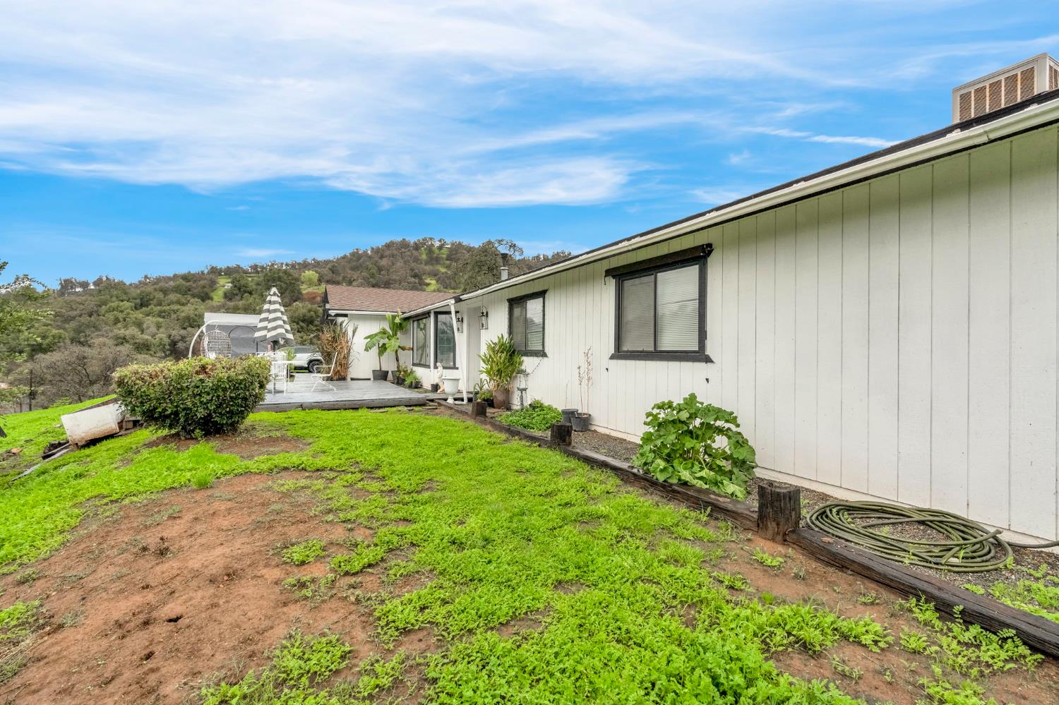 29668 Seminole Road Tollhouse, CA 93667 - Photo 5 of 28 a view of a house with backyard and garden