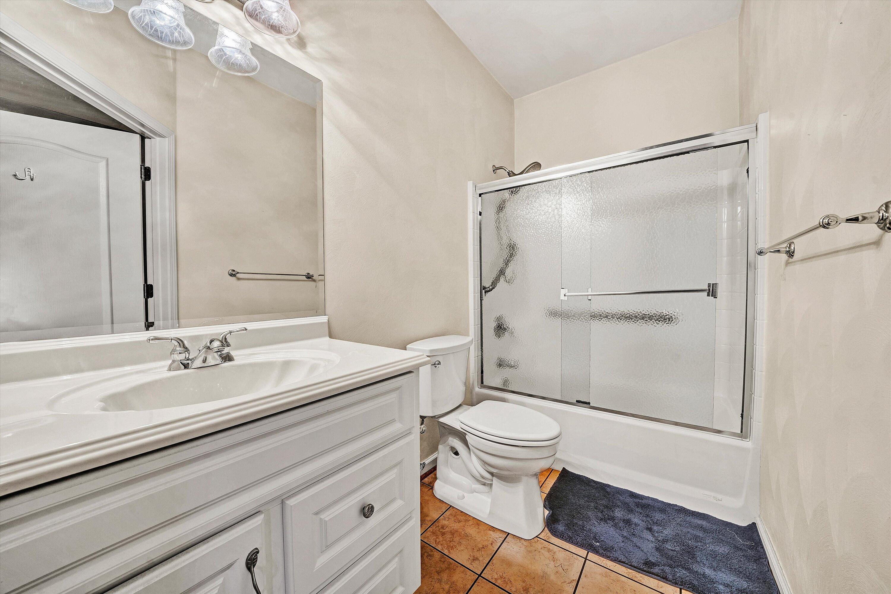 80 Stoney Mill Road Rocky Mount, VA 24151 - Photo 21 of 27 a bathroom with a granite countertop sink toilet and shower