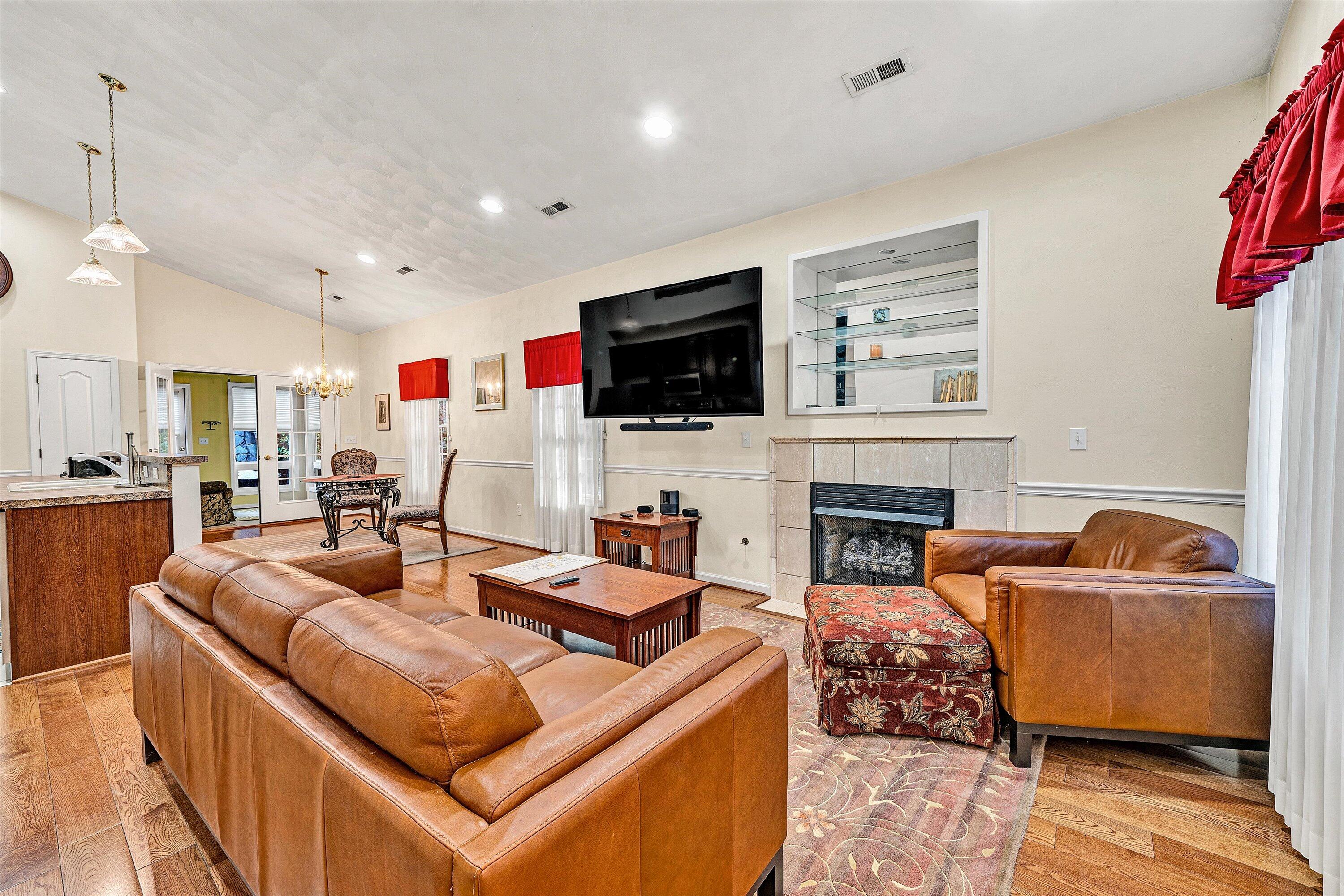 80 Stoney Mill Road Rocky Mount, VA 24151 - Photo 6 of 27 a living room with fireplace furniture and a flat screen tv