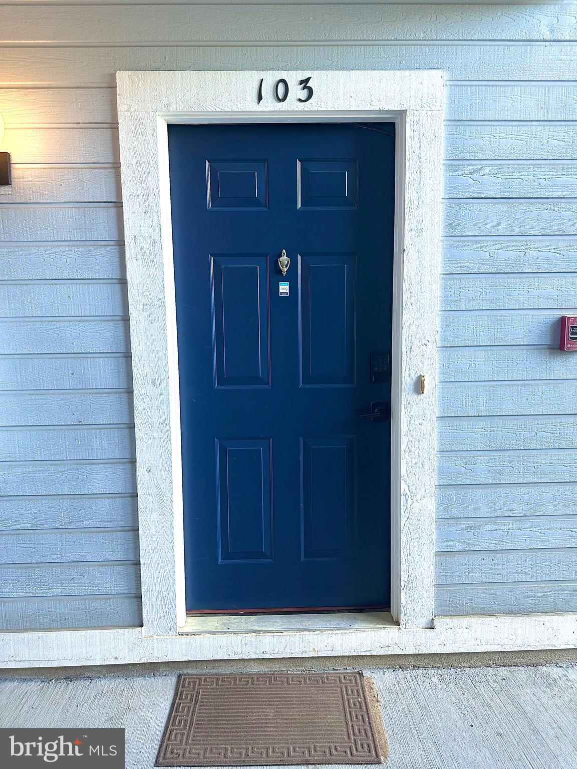 601 Forest Walk Lane, Unit 103 Odenton, MD 21113 - Photo 2 of 20 a view of entrance door of the house