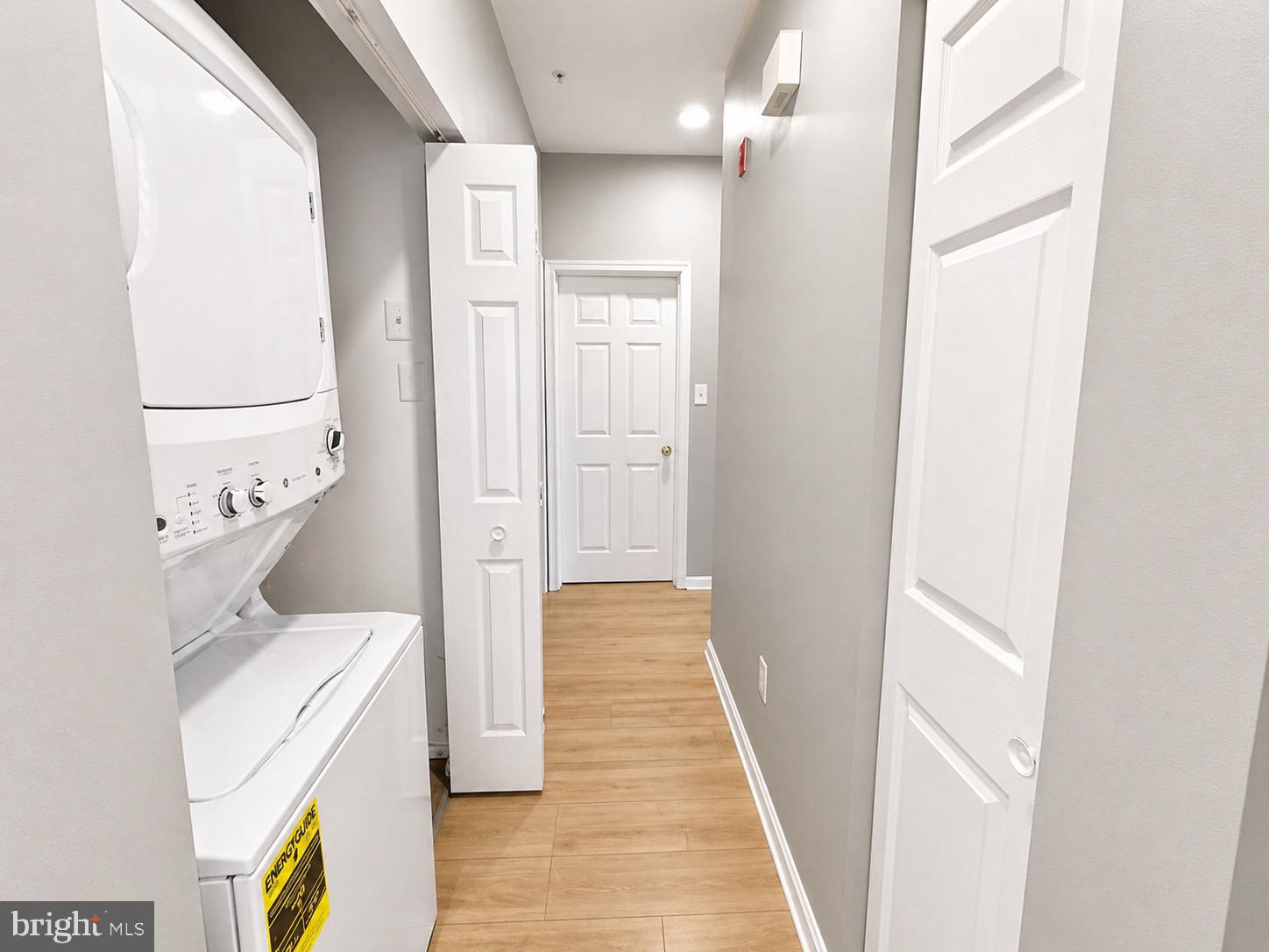 601 Forest Walk Lane, Unit 103 Odenton, MD 21113 - Photo 10 of 20 a room with a washer and dryer