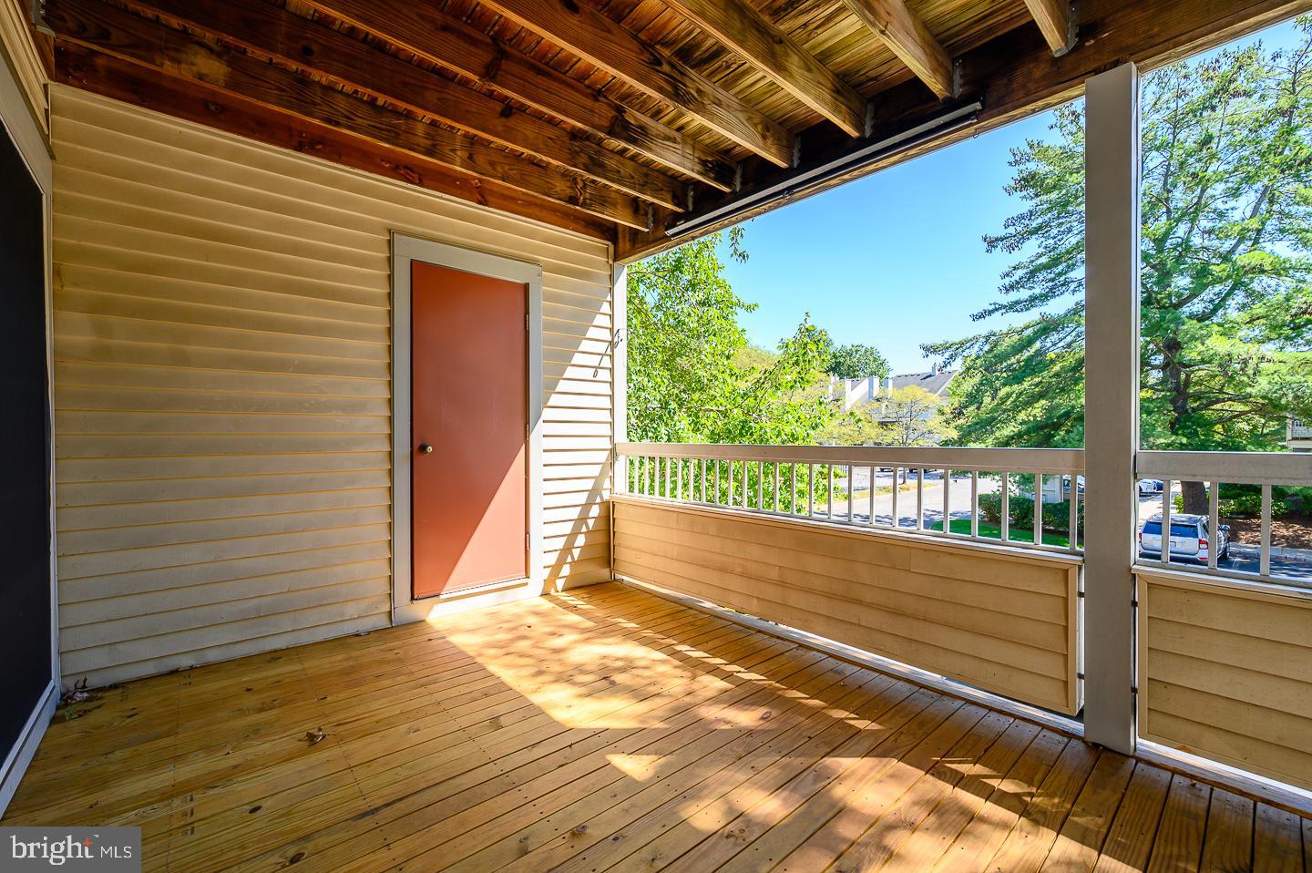115 Cascade Court, Unit 7 Princeton, NJ 08540 - Photo 22 of 27 a view of a balcony with wooden floor